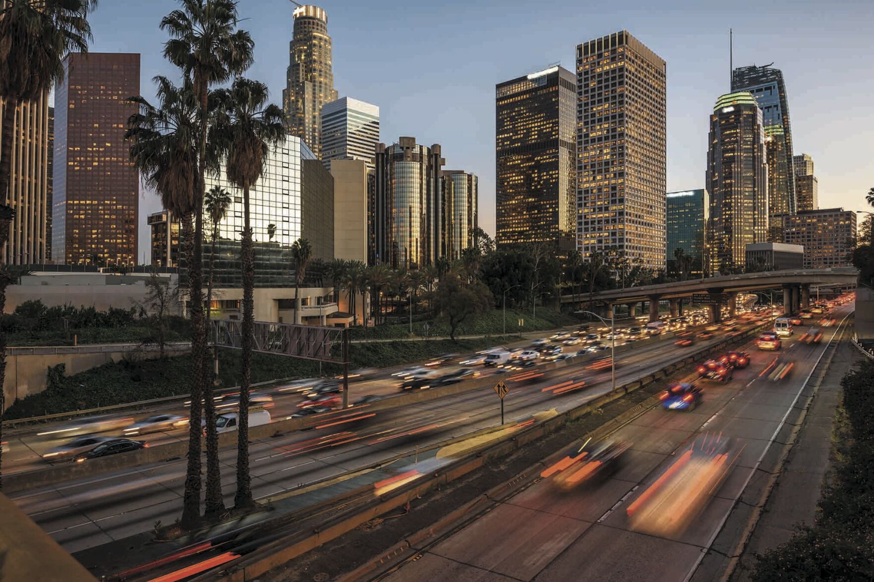 Traffic in downtown Los Angeles, California at sunset